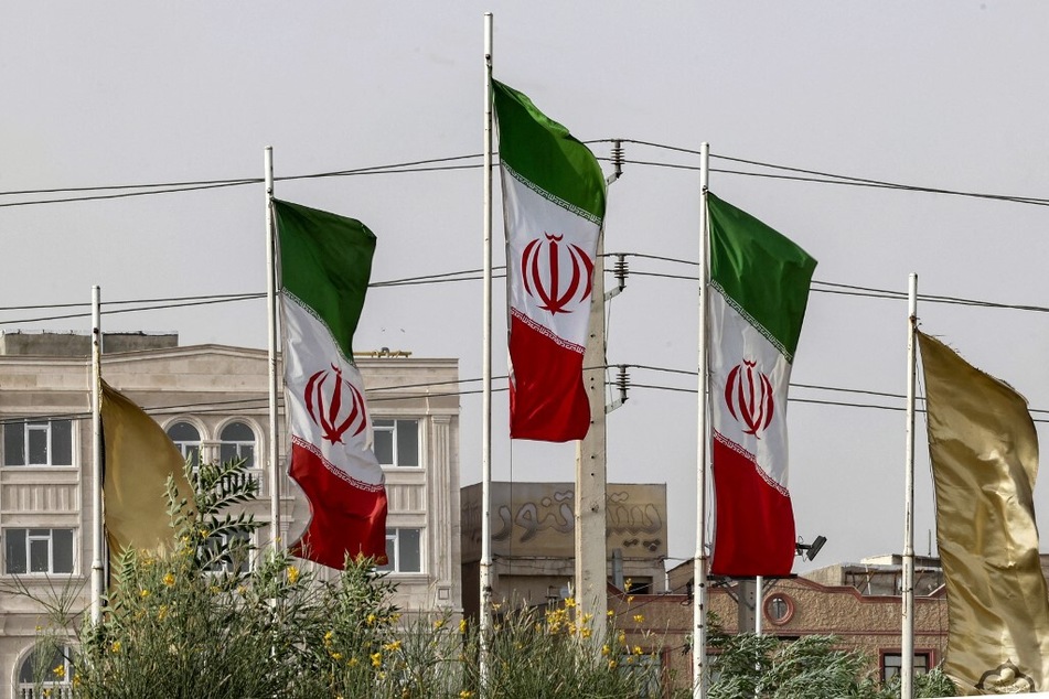 The flags of Iran flutter in the south of the capital Tehran.