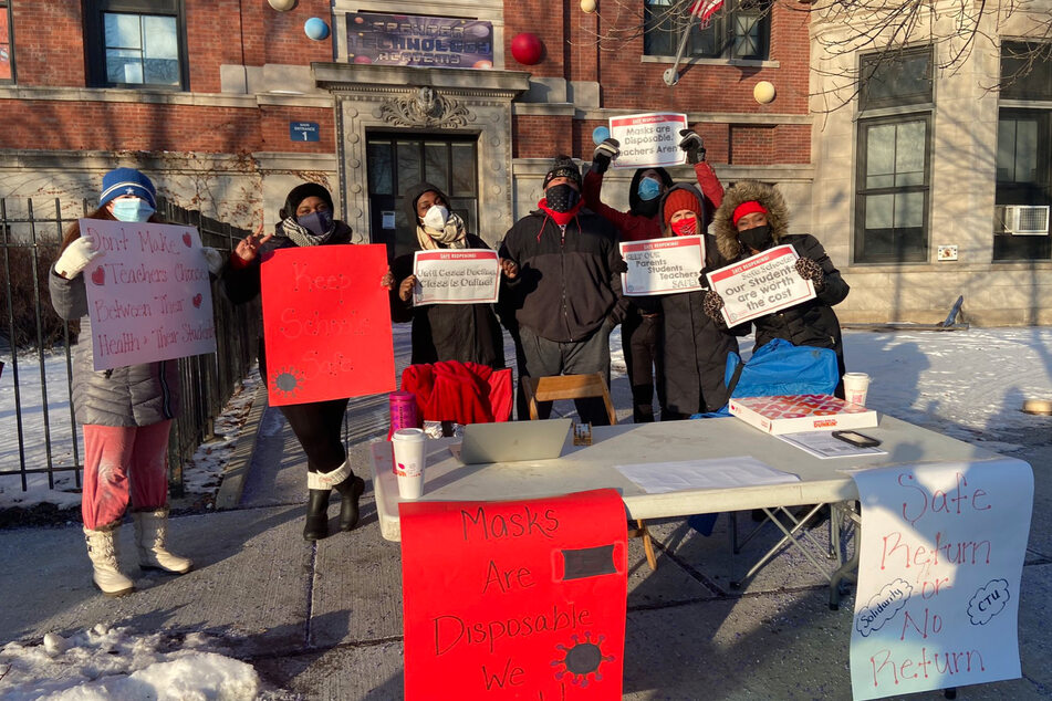 Chicago teachers rally in favor of greater Covid-19 protections in the classroom.