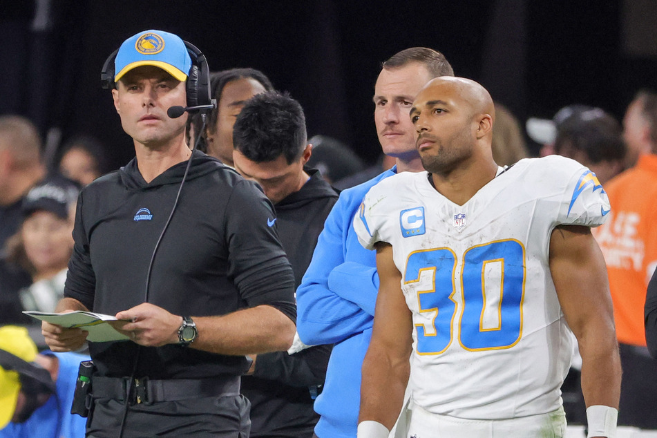 Brandon Staley (l) has been fired as coach of the Los Angeles Chargers after the team's humiliating loss to the Las Vegas Raiders.
