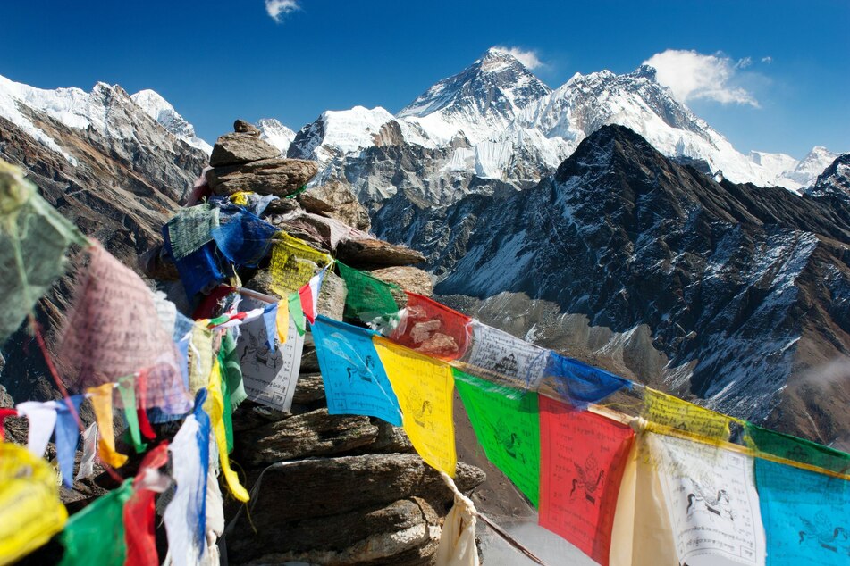 Flags on the top of Mount Everest (stock image).