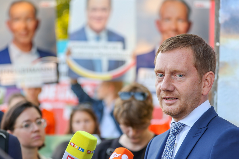 Zum Endspurt im Wahlkampf besuchte Sachsens Ministerpräsident Michael Kretschmer (46, CDU) am Freitag die Stadt Taucha und berichtete von einer Morddrohung, die er erhalten hat.