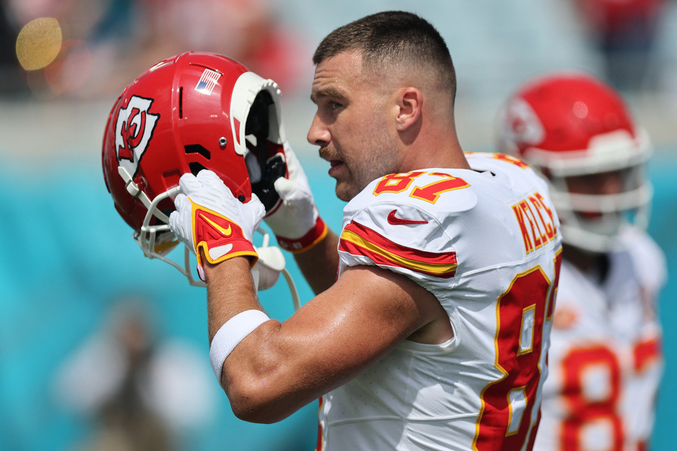 Vaccine skeptics are attacking Travis Kelce for participating in a Pfizer advertisement, citing old theories about Covid-19 shots.