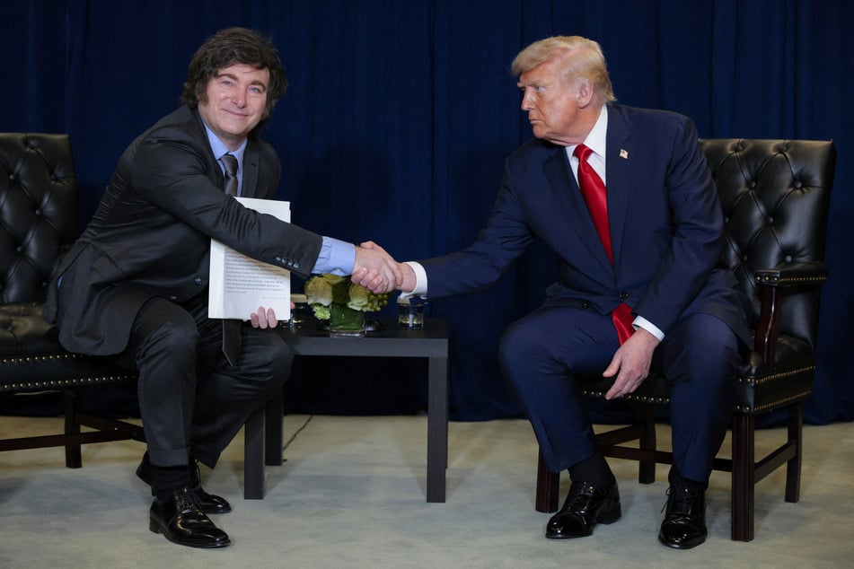 US President Donald Trump (r.) shakes hands with President of Argentina Javier Milei during a bilateral meeting at the 80th session of the UN General Assembly in New York City on September 23, 2025.