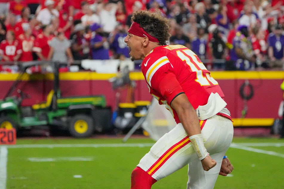 Kansas City Chiefs quarterback Patrick Mahomes celebrates on field after the win over the Baltimore Ravens at GEHA Field at Arrowhead Stadium.