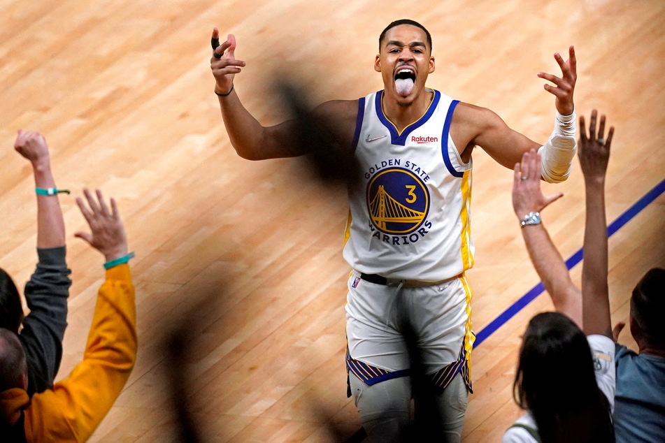 Jordan Pool celebrates after his buzzer-beater at the end of the third quarter.