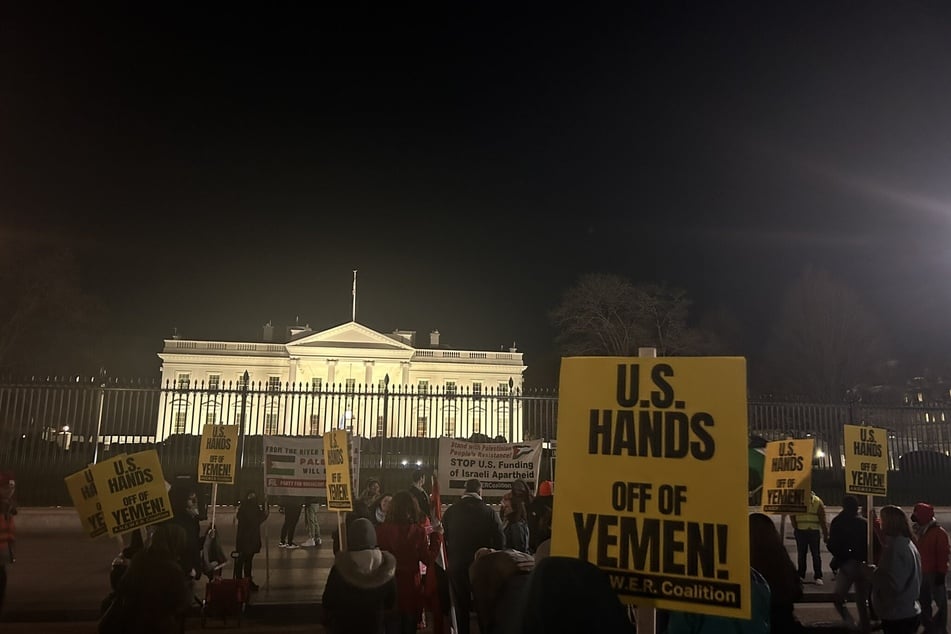Protesters begin to gather outside the White House to demand an end to US military actions against Yemen.