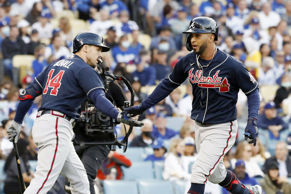 Eddie Rosario (r.) of the Atlanta Braves was back for more high-powered hitting in game four of the NLCS.