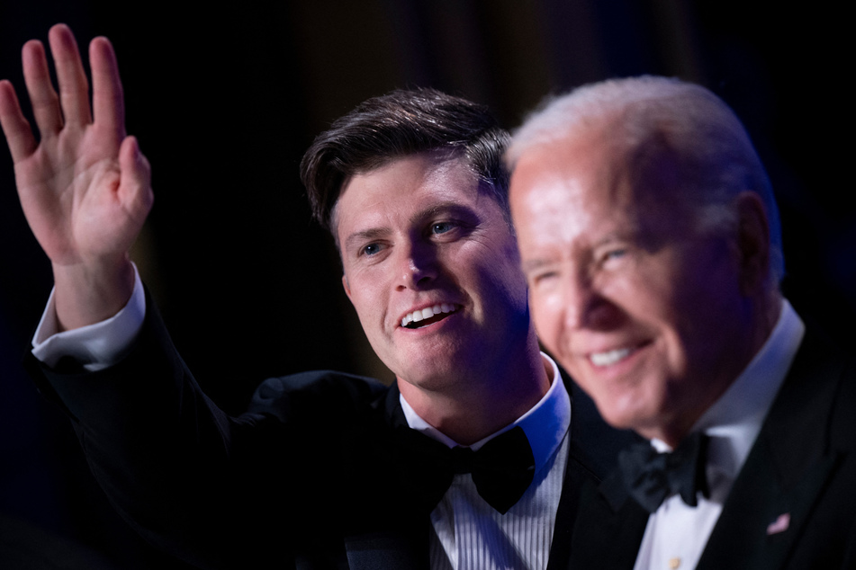 Saturday Night Live star Colin Jost (l.) praised President Biden at the White House dinner.