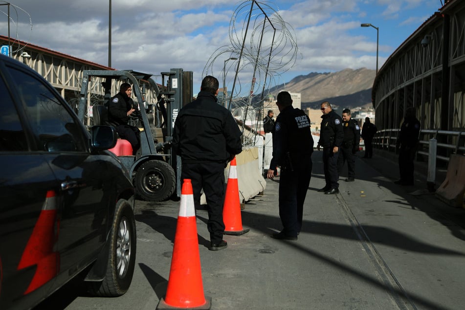 US Customs and Border Protection officers conduct a mobile field force training exercise at Paso del Norte-Santa Fe international bridge in Ciudad Juarez, Chihuahua state, Mexico on Friday.