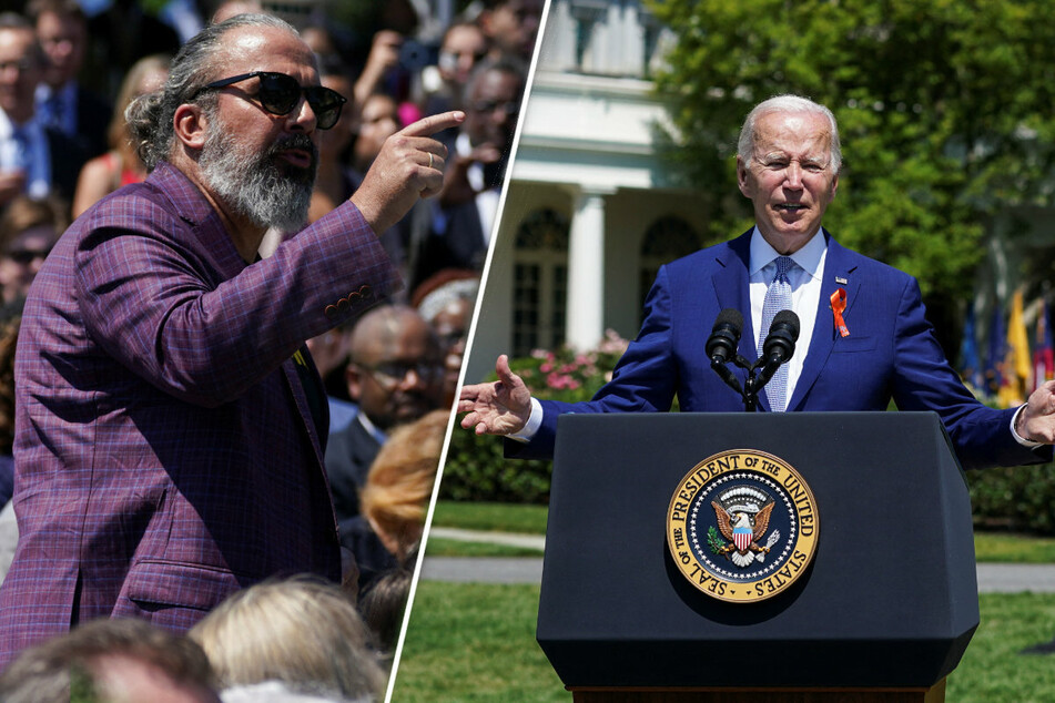 Manuel Oliver (l.), father to one of the Parkland shooting victims, stood up to interrupt President Joe Biden's speech on the Safer Communities Act.