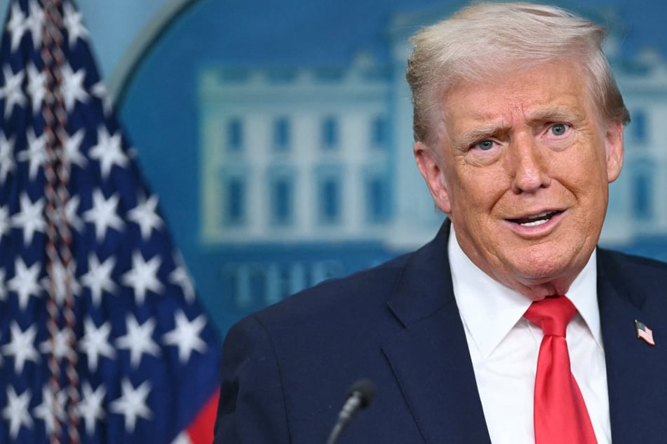 Trump focuses on old grievances in rambling speech marking one year back in office