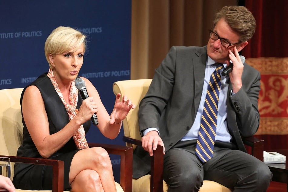 Joe Scarborough (R) and Mika Brzezinski speaking during a Harvard Kennedy School Institute of Politics event in Washington DC on July 12, 2017.