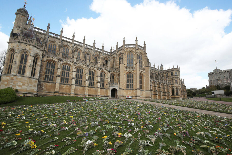 Floral tributes at Windsor Castle on the eve of the funeral of Prince Philip, the Duke of Edinburgh.