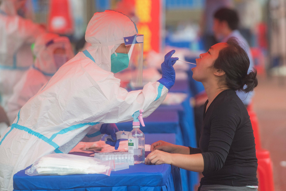 A resident takes a nucleic acid test in the Dongxihu District in Wuhan.