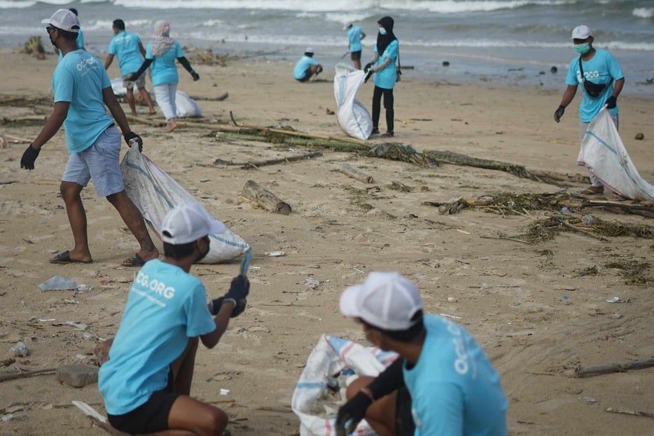 Ocean Cleanup Group cleans the beach from plastic pollution in Bali, Indonesia.