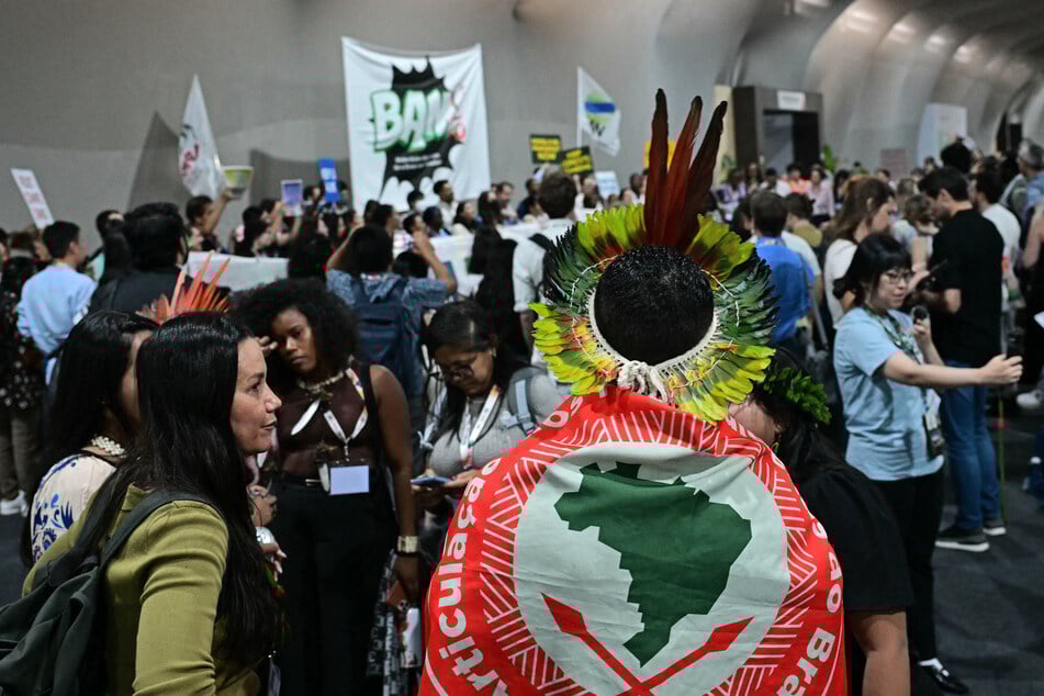 Members of the Belem Action Mechanism hold a demonstration during COP30 in Belem, Brazil, on November 21, 2025.