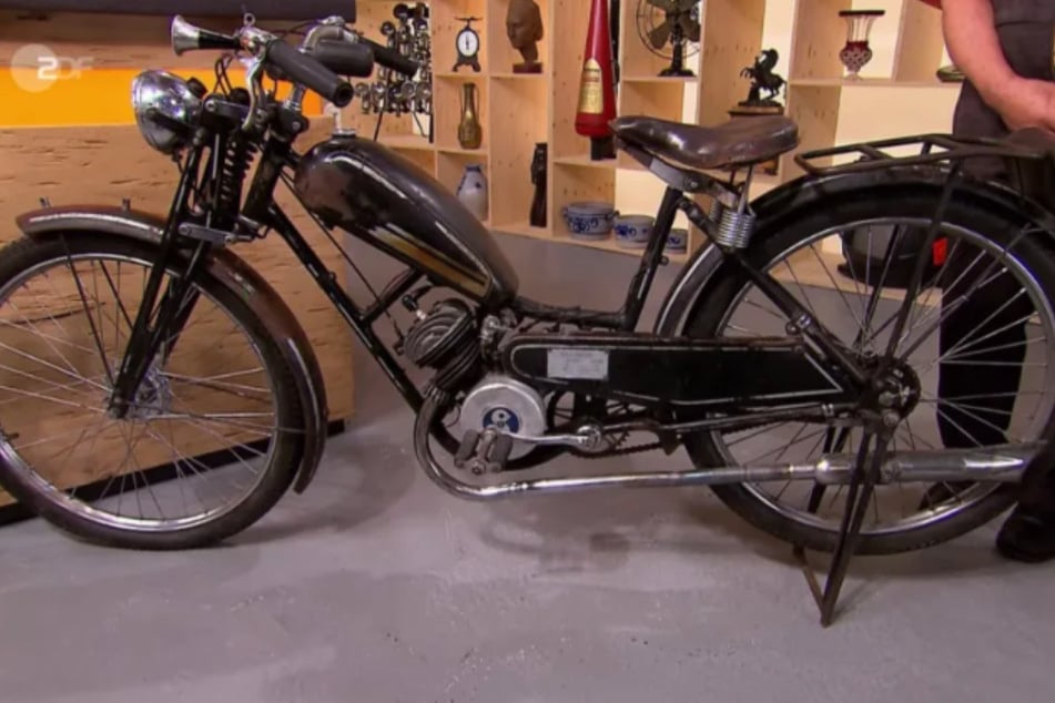Die beiden wollen in der ZDF-Sendung ein Damen-Motorrad aus dem Jahr 1938 verkaufen. Es stammt aus den Presto-Werken in Chemnitz.