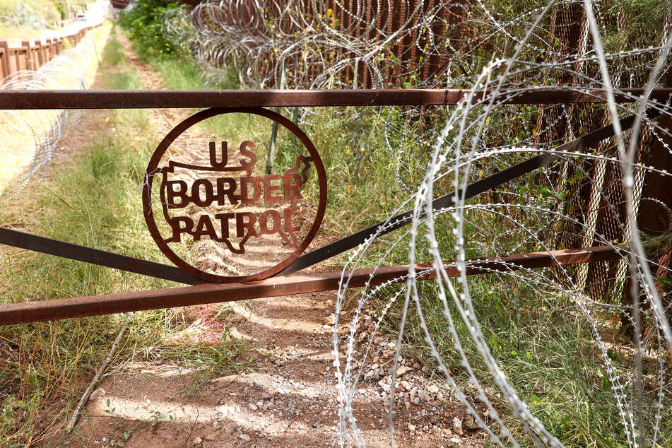 A metal gate is seen near the US-Mexico border wall in Nogales, Arizona on September 17, 2025.