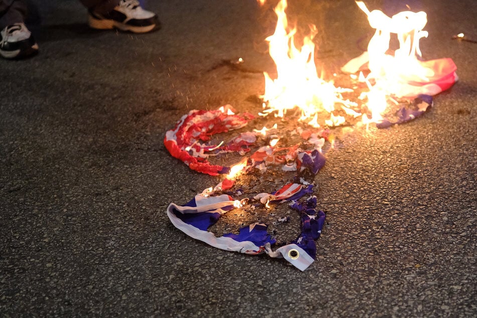 President Donald Trump has decided against signing an executive order to charge people who burn the American flag.