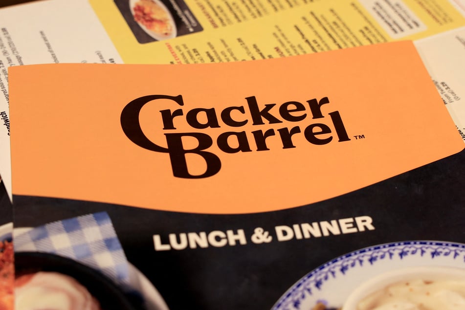 Cracker Barrel issued an apology to customers on Monday – but is expected to keep its minimalist new logo.
