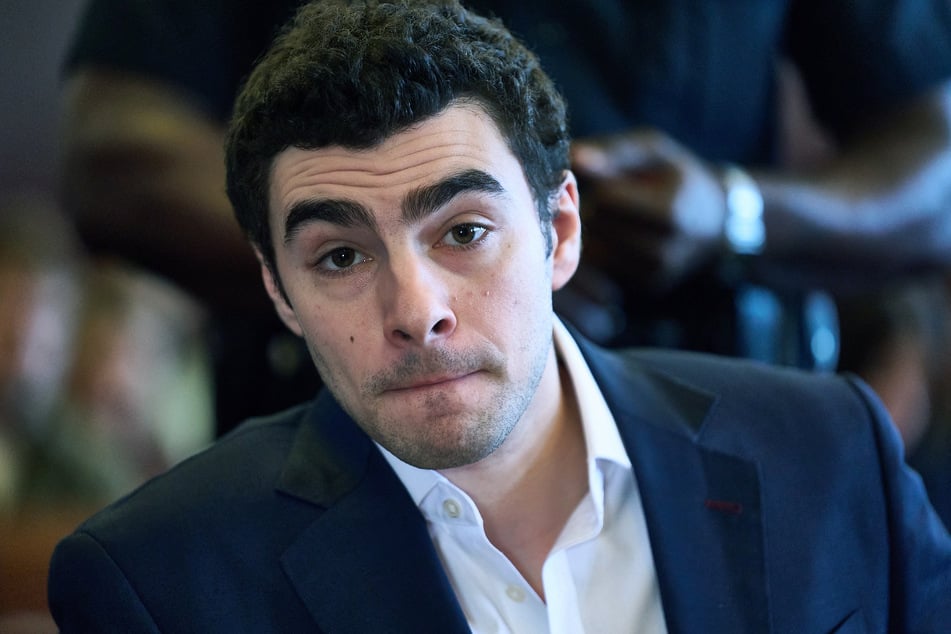 Luigi Mangione appears for a suppression of evidence hearing in the killing of UnitedHealthcare CEO Brian Thompson in Manhattan Criminal Court on December 18, 2025.