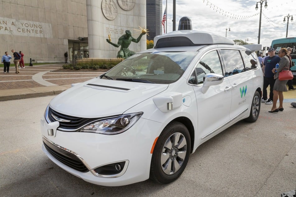 A Waymo self-driving car on display at the Detroit Moves Mobility Festival.