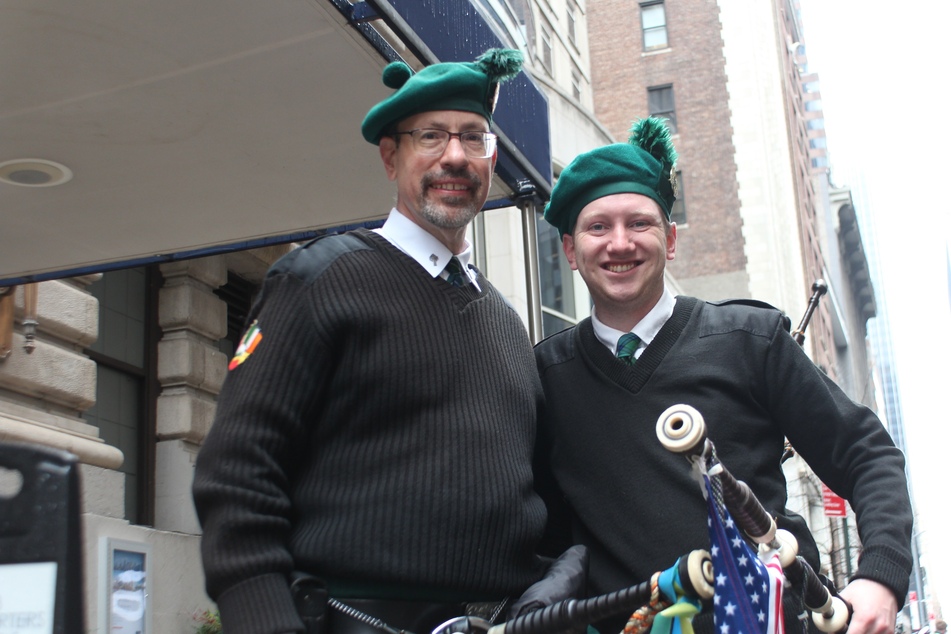 Members of the Manhattan College Marching Band right before they head out for the parade.