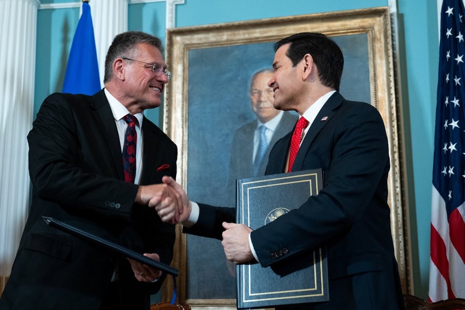 European Union Trade Commissioner Maros Sefcovic and US Secretary of State Marco Rubio shake hands after signing a memorandum of understanding for a strategic partnership on critical minerals in Washington DC on April 24, 2026.