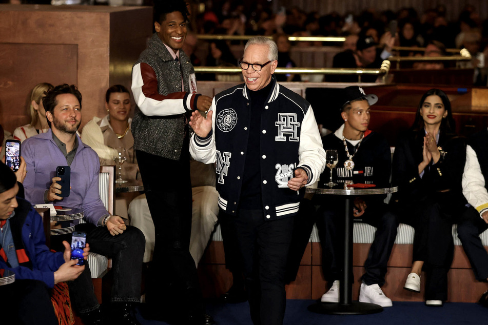 (L-R) Jon Batiste and Tommy Hilfiger walk the runway at the Tommy Hilfiger fashion show during New York Fashion Week - February 2024: The Shows on Friday in New York City.