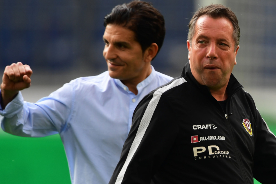 Dynamo-Coach Markus Kauczinski (rechts) war angefressen, sein 96-Kollege Kenan Kocak ballte dagegen die Siegerfaust.
