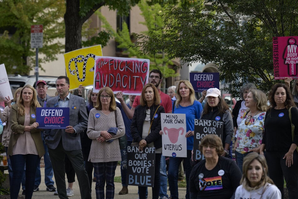 Activists protest during a "Bans Off Our Bodies" rally in support of abortion rights at Old Bucks County Courthouse in Doylestown, Pennsylvania, on September 29, 2022.