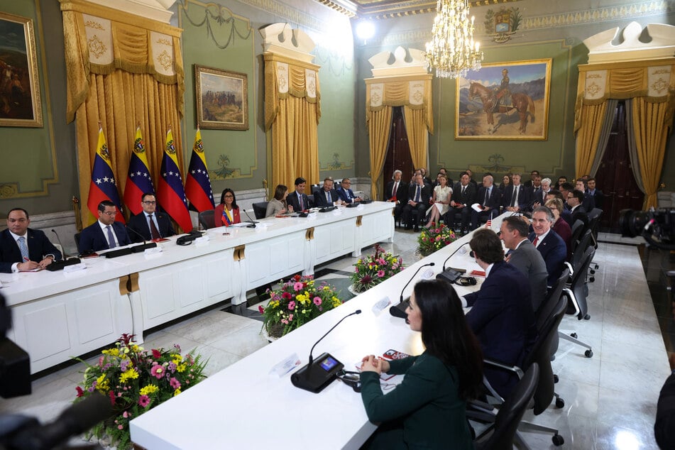 Venezuela's interim President Delcy Rodriguez and US Interior Secretary Doug Burgum hold talks in Caracas on March 4, 2026.