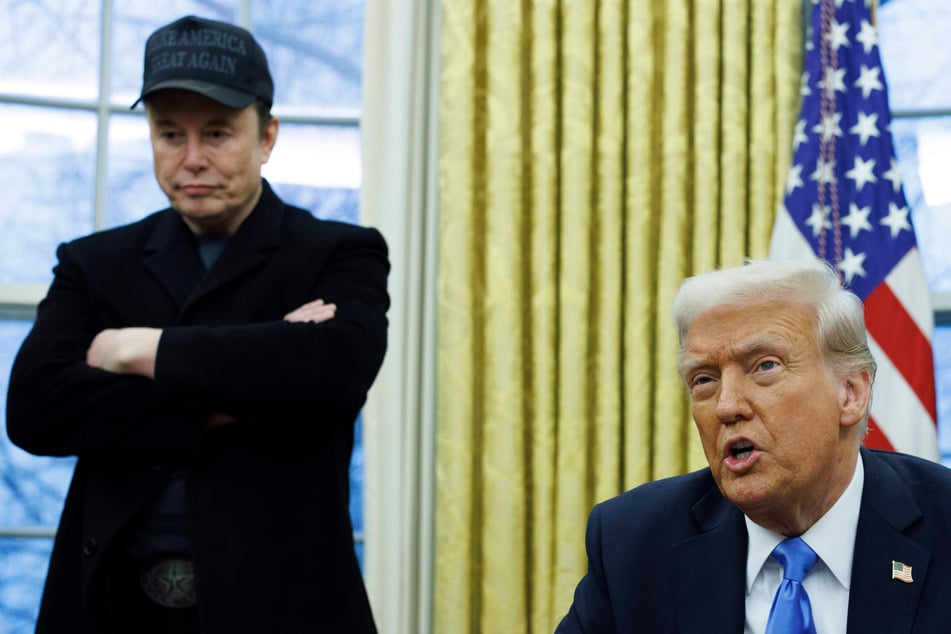 Elon Musk (l.) has said he would work with President Donald Trump for as long as he "can be helpful," as the pair dismissed concerns over possible conflicts of interest.