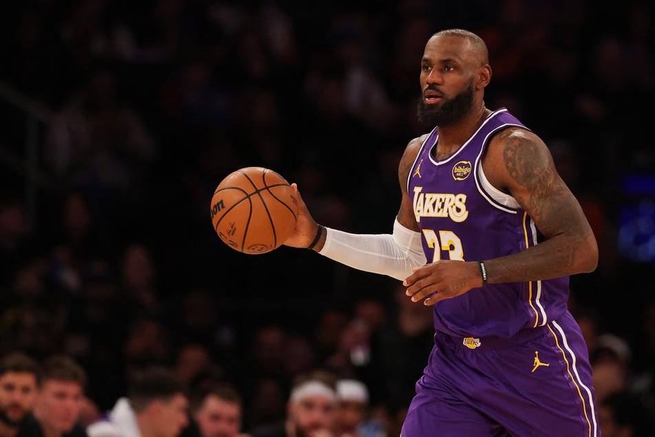 LeBron James of the Los Angeles Lakers dribbles the ball during the fourth quarter against the New York Knicks at Madison Square Garden on February 1, 2026.