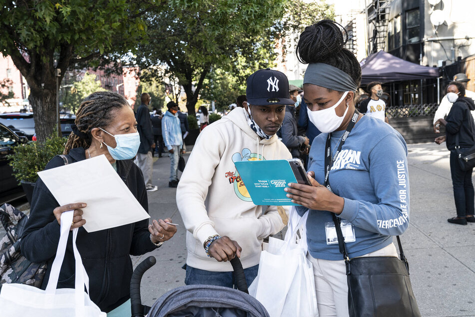 Volunteers assist New Yorkers to fill out the 2020 Census – a count that takes place every 10 years.