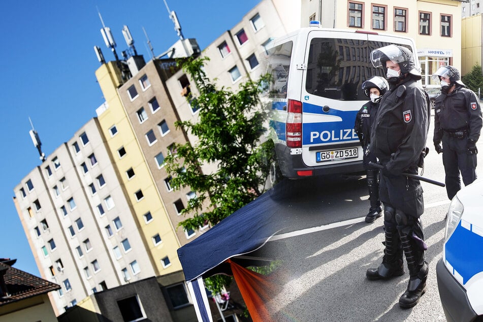 Polizisten stehen vor dem betreffenden Hochhaus in Göttingen.