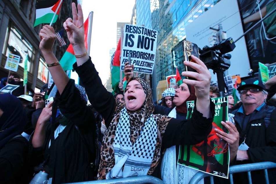 Palestinian rights protesters rally in Times Square in New York City on October 13, 2023.