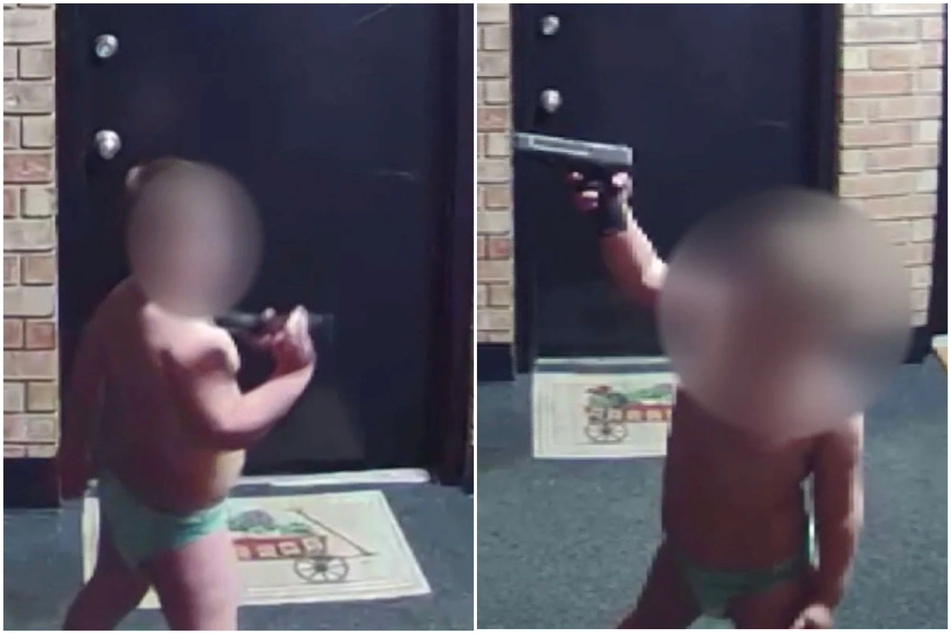 An Indiana father was arrested after his toddler was caught on video playing with a handgun in the hallway of their apartment complex.