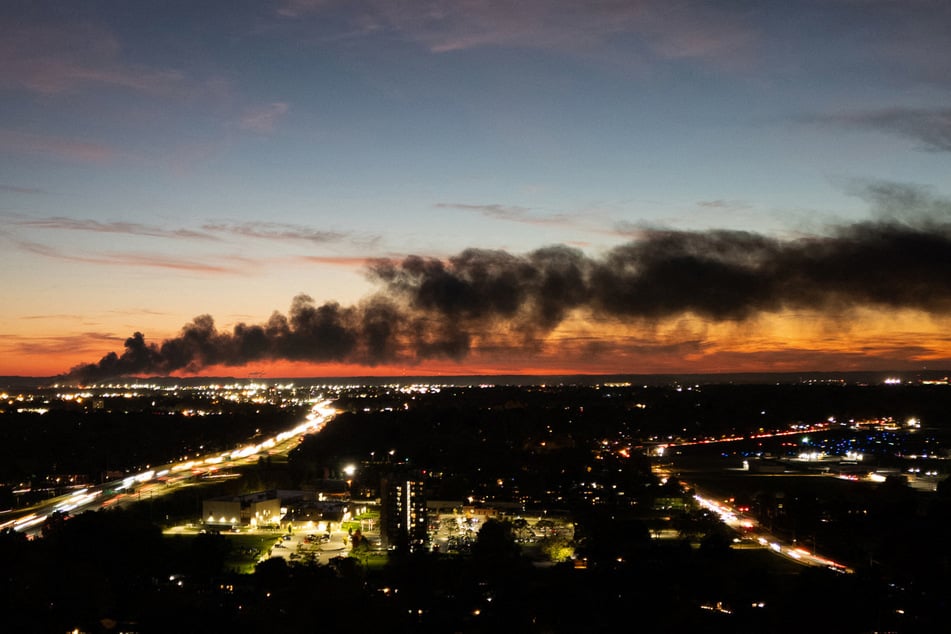 Smoke rises from the site of a UPS cargo plane crash near the UPS Worldport facility in Louisville, Kentucky, on November 4, 2025.