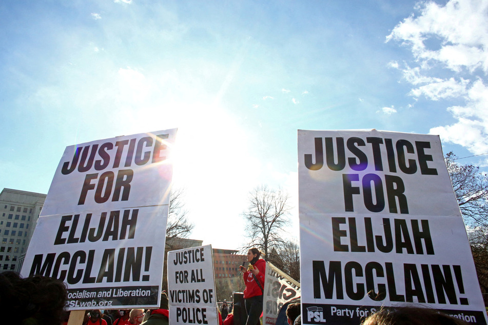 A jury found one white police officer guilty in the killing of Elijah McClain while acquitting another.
