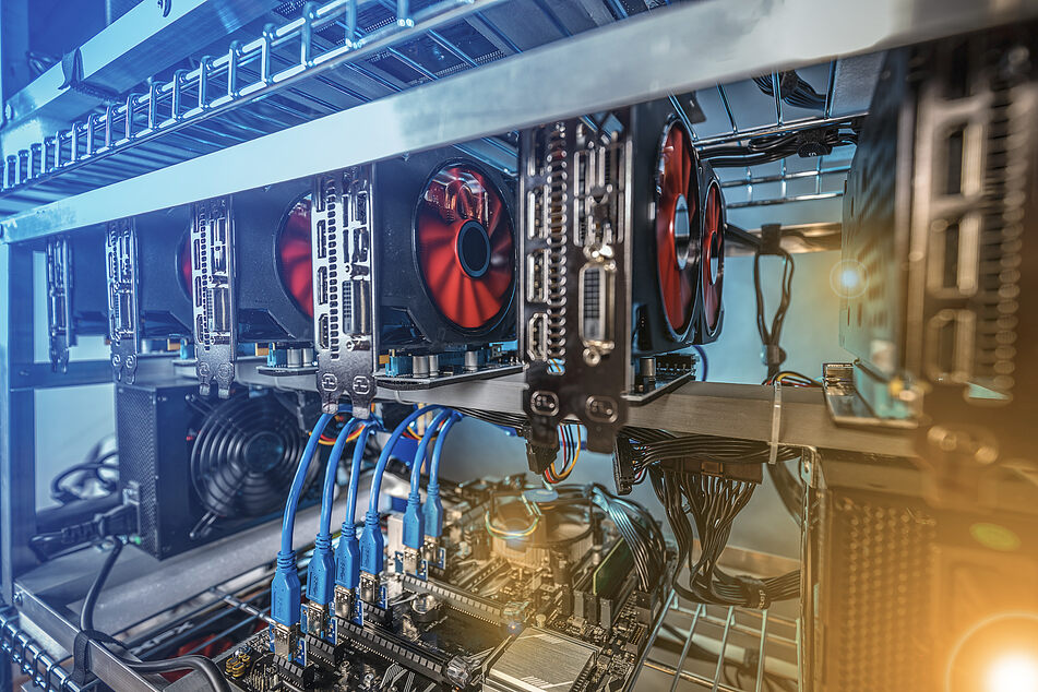 A crypto mining rig is usually a tricky setup of linked graphics cards.