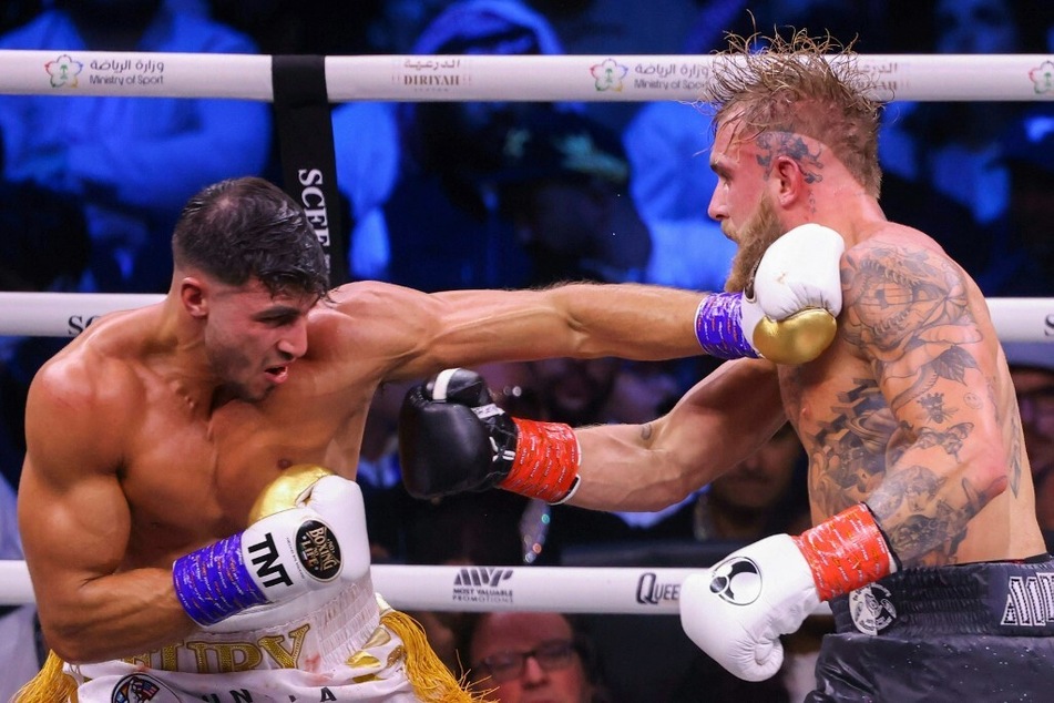 While both Jake Paul (r) and Tommy Fury showcased textbook jabs and fancy footwork, the 23-year-old British boxer came out victorious in a split decision.