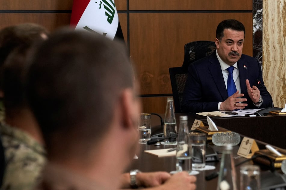 Iraqi Prime Minister Mohamed Shia al-Sudani chairs the first session of negotiations between Iraq and the United States to wind down the International Coalition mission, in Baghdad on January 27, 2024.