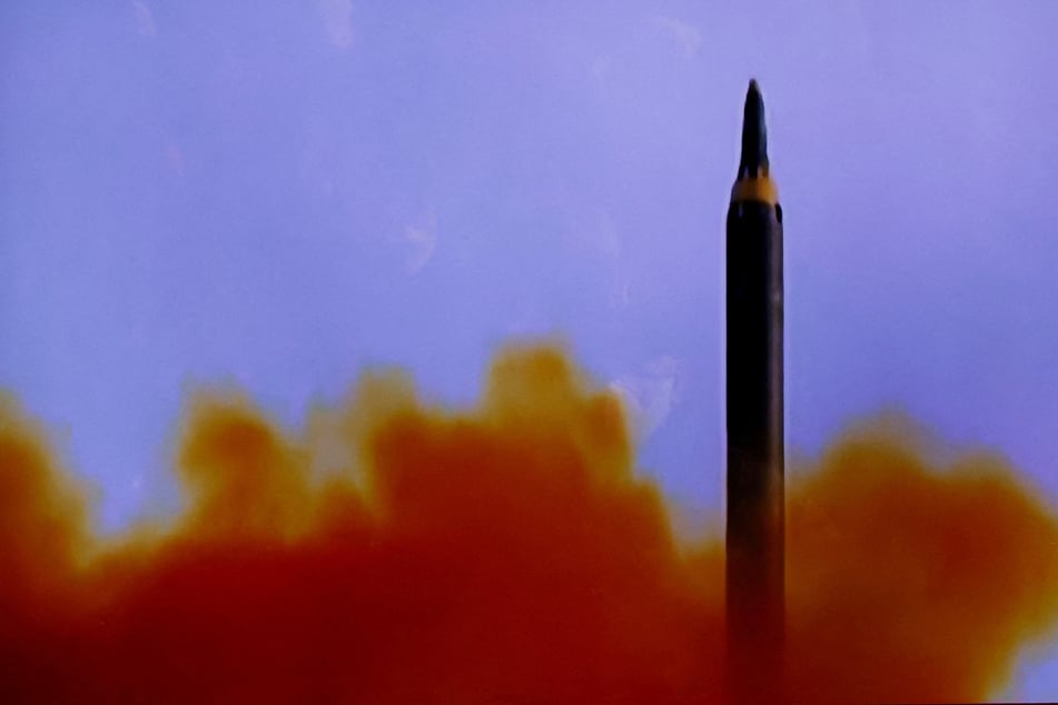North Korea fires pair of ballistic missiles as Japan issues emergency alert