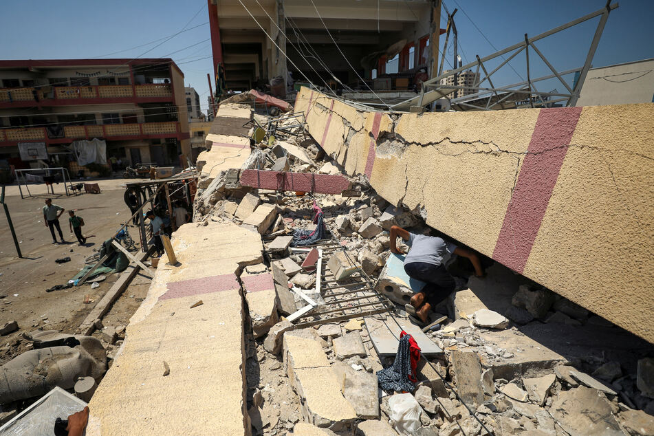 At least 10 Palestinians were killed in the latest Israeli bombing of a school housing displaced people in Gaza, according to local authorities.