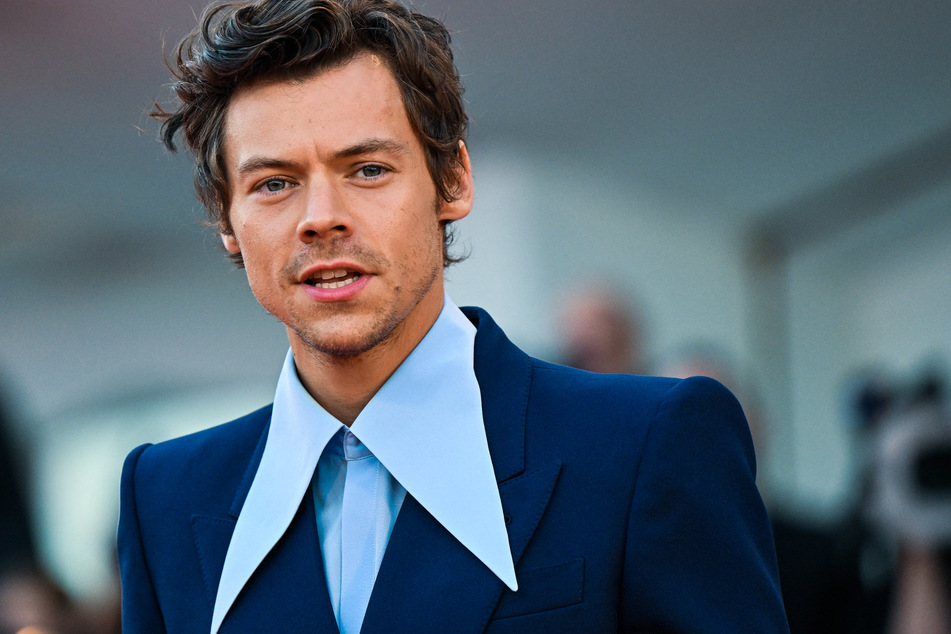 Harry Styles promotes "Don't Worry Darling" at the Venice Film Festival in September 2022.