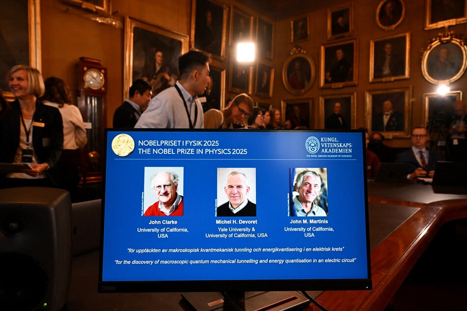 British physicist John Clarke, French physicist Michel H. Devoret, and US physicist John M. Martinis are announced as winners of the 2025 Nobel Prize in Physics at the Royal Swedish Academy of Sciences in Stockholm, Sweden, on October 7, 2025.