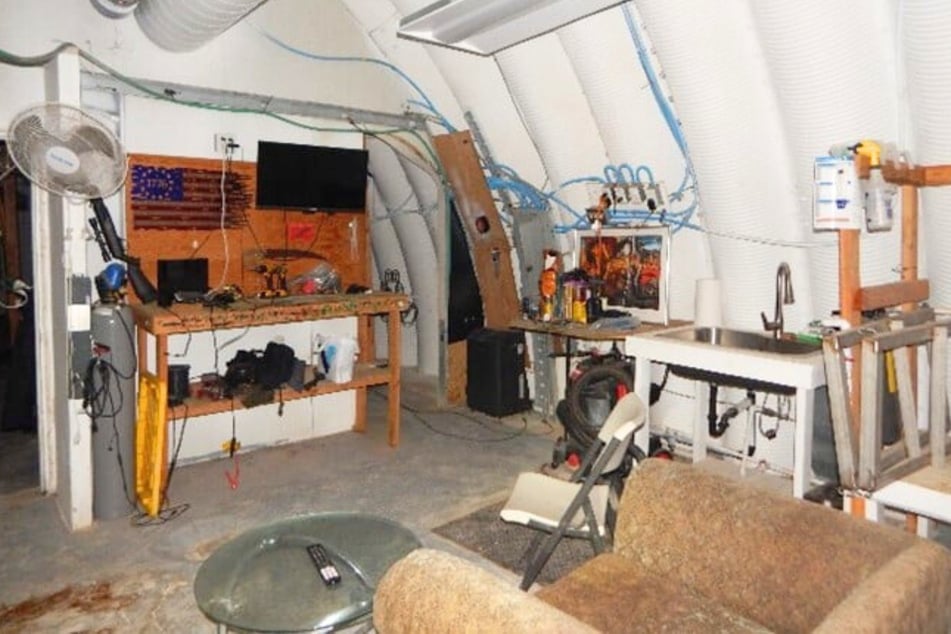 MAGA activist Michael Kamfolt was recently arrested after California officers discovered a bunker filled with illegal firearms underneath his home.