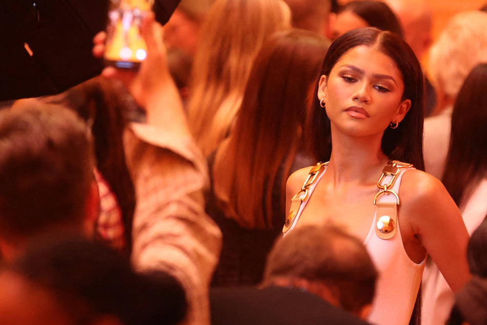 Zendaya stuns in daring plunge gown and goes for gold with vintage fashion in Paris