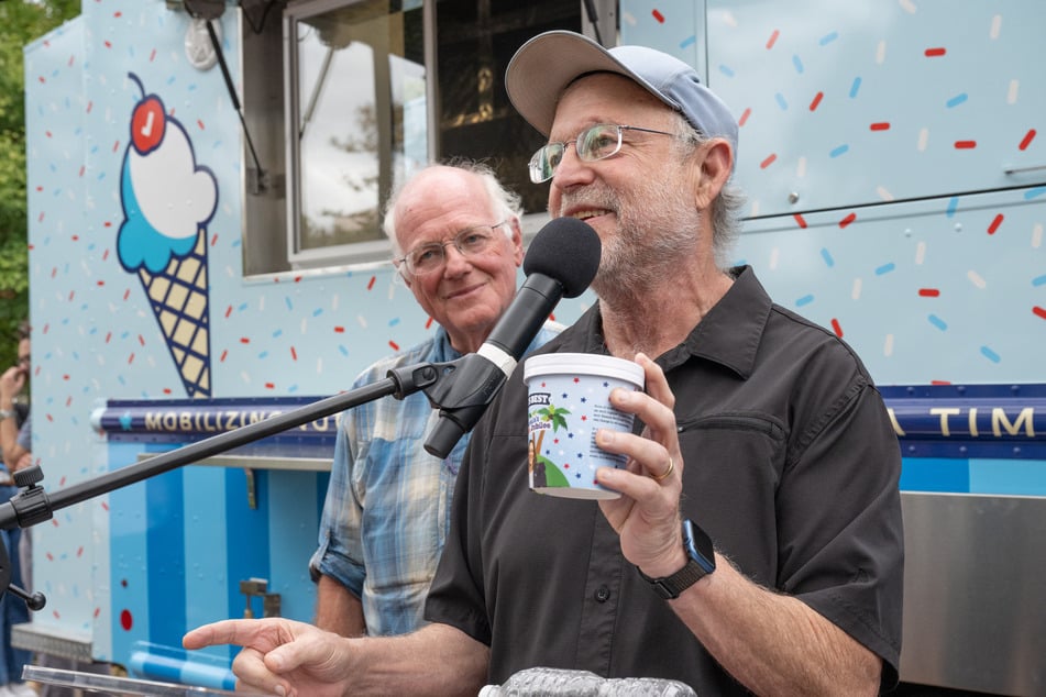 Ben Cohen (l.) and Jerry Greenfield (r.), co-founders of Ben &amp; Jerry’s, hand out free ice cream at Franklin Square in Philadelphia during their Scoop The Vote tour in support of Kamala Harris and Democrats down the ballot on September 16, 2024.